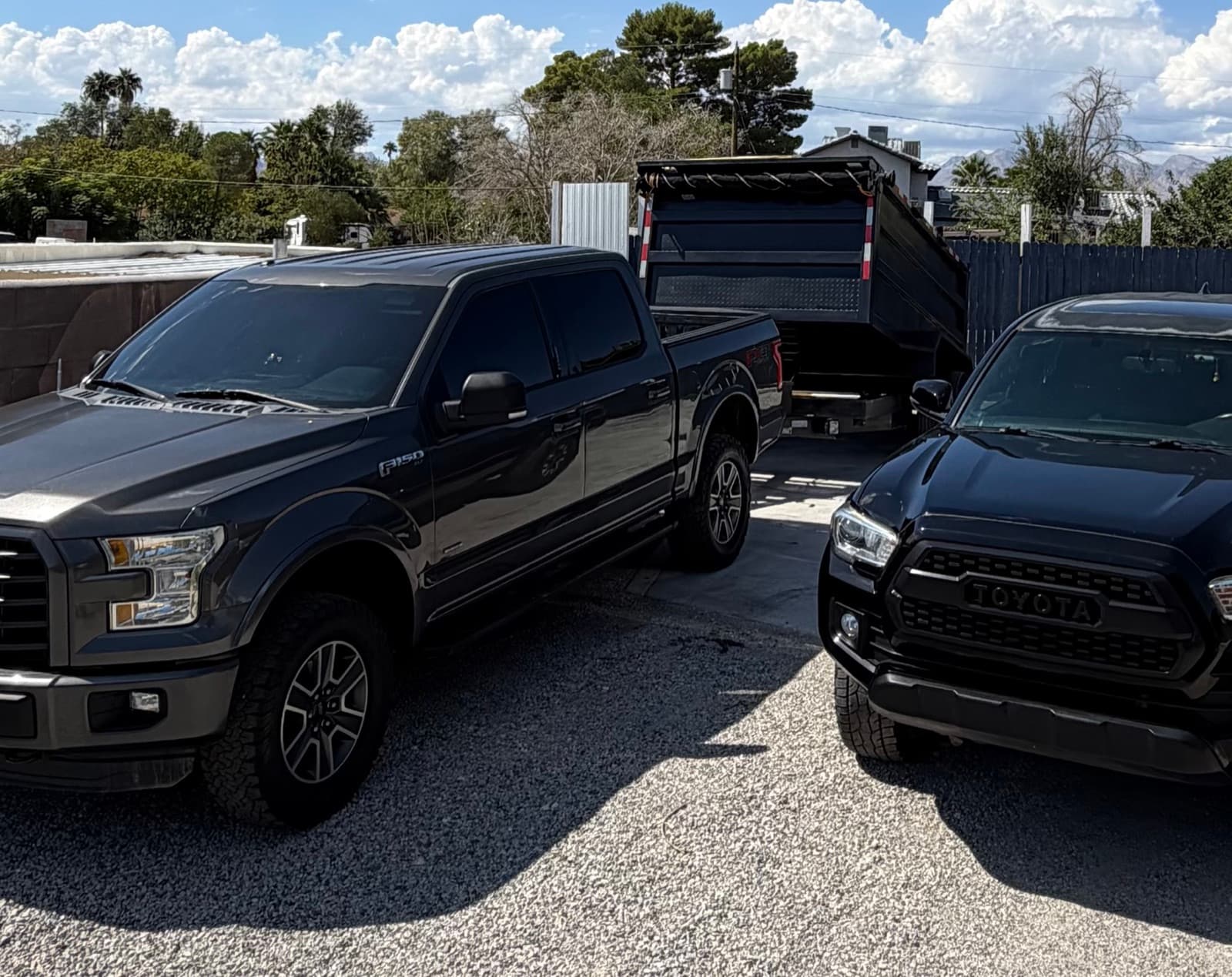 JunkMD LV pickup trucks and dump trailer, ready for a job in Las Vegas
